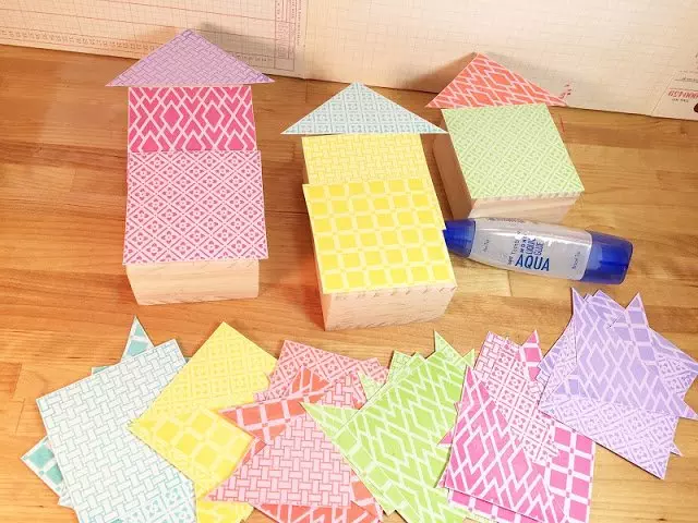 Cut out shapes and attach to wooden houses with Tombow MONO Aqua Glue Ann Butler Designs Faux Quilting Stamps Creatively Beth #creativelybeth #annbutlerdesigns #stamping #homedecor #DIY