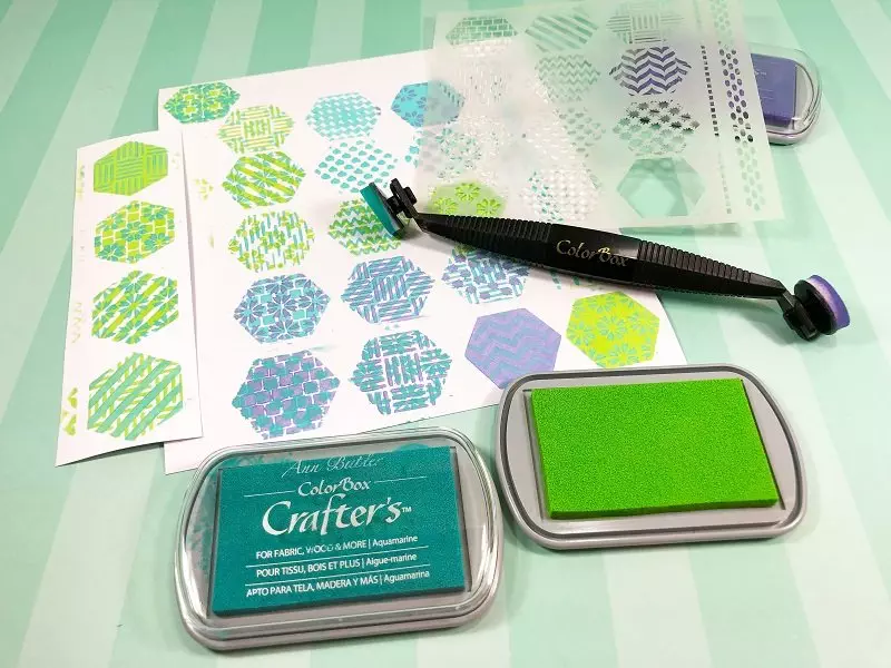 Layer the aqua, lime and lavender ink colors on the white paper using the hexagon stencil Creatively Beth #creativelybeth #annbutlerdesigns #cards #stencils #hexagons 