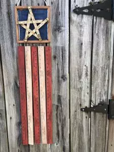 Create a vintage ruler american flag door hanger with supplies from the hardware store and my favorite DecoArt paints! #americanflag #creativelybeth #decoart