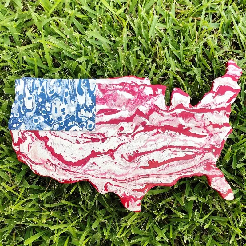 Learn how to create a Paint Pour American Flag with DecoArt on a USA wooden plaque a patriotic tutorial with Creatively Beth