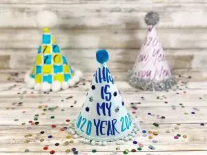 Hand-Lettered Party Hats for New Years Eve - Creatively Beth #creativelybeth #handlettered #newyearseve #freeprintable
