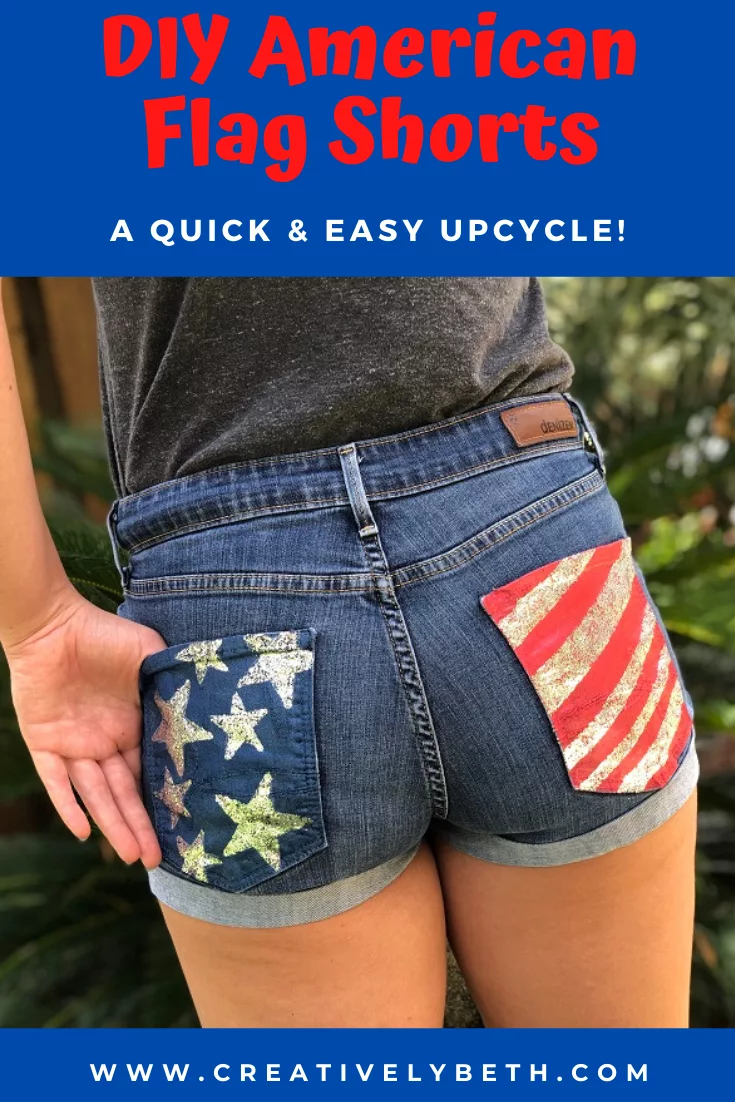 Upcycled Jean Shorts painted with silver and blue stars on one pocket with red and silver stripes on the other pocket #creativelybeth #upcycle #jeanshorts #americanflag