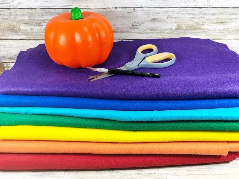Materials needed to create Dollar Tree Rainbow Pumpkins Creatively Beth #creativelybeth #dollartreecrafts #halloweencrafts #pumpkincrafts #rainbowcrafts #createwithkunin