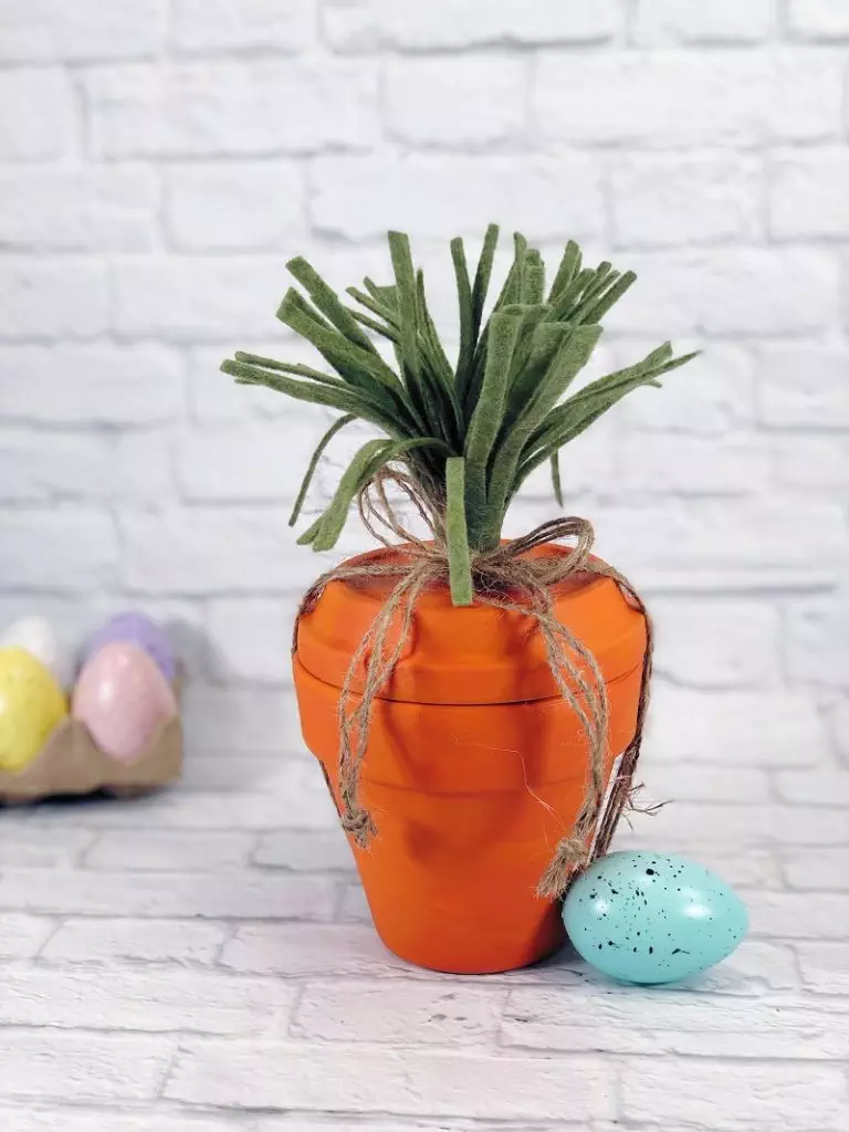 Clay Pot Carrot Container for Spring Creatively Beth #creativelybeth #claypotcrafts #eastercrafts #springcrafts #carrotcrafts #flowerpotcrafts