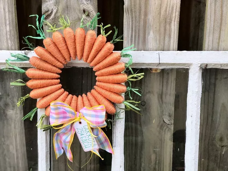 The Sweetest Dollar Tree Carrot Wreath for Easter by Creatively Beth #creativelybeth #dollartreecrafts #easterwreath #dollartreecarrots #springwreath