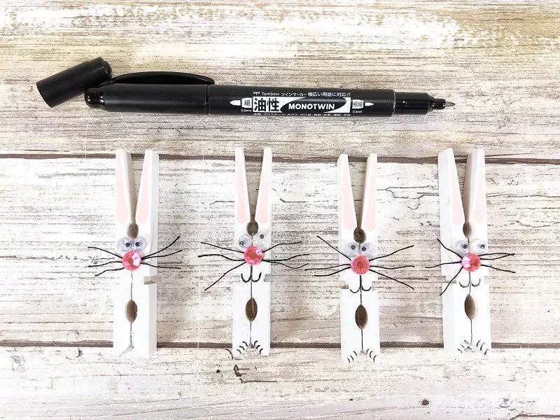 Draw a mouth and paws on Clothespin Bunny with MONOTWIN Permanent Marker Creatively Beth #creativelybeth #dollatreecrafts #eastercrafts #bunny #bunnies #clothespincrafts