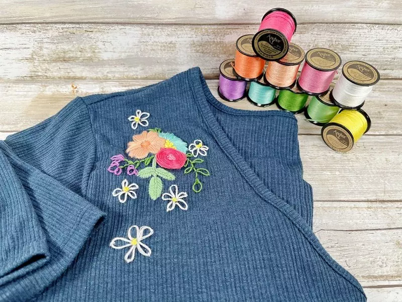 Floral Embroidered T-Shirt with Free Pattern by Creatively Beth #creativelybeth #anchorfloss #embroideryflossspools #floralembroidery #handembroidery #freepattern