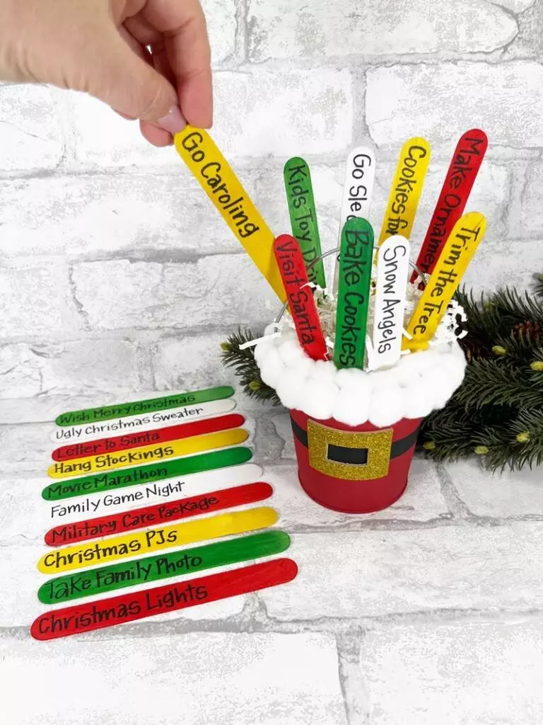 Dollar Tree Christmas Bucket List with Free Printable Creatively Beth #creativelybeth #christmas #bucket #list #dollartree #craftstick #popsiclestick #freeprintable #family #craft #diy