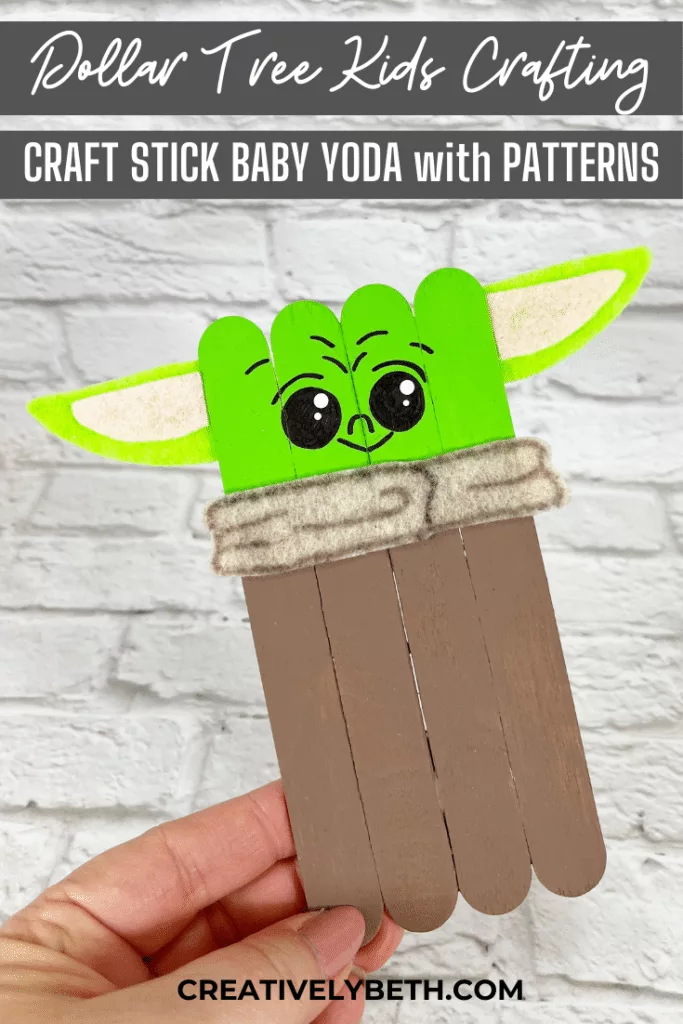 Craft Stick Baby Yoda Grogu Kids Craft Creatively Beth #creativelybeth #babyyoda #grogu #mandalorian #starwars #craftsticks #dollartree #popsiclesticks #diy #freepatterns