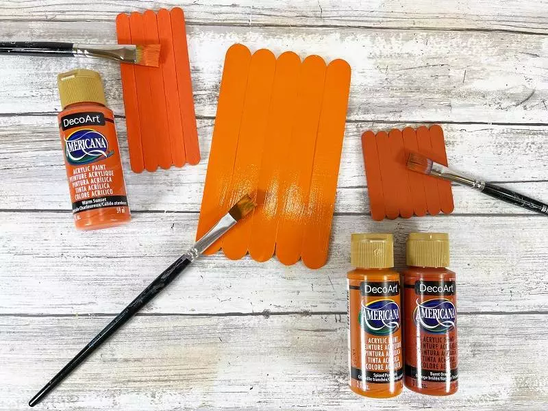 Dollar Tree Craft Stick Halloween Jack-O-Lantern Trio Creatively Beth #creativelybeth #dollartree #diy #craft #kids #pumpkin #jackolantern #halloween #craftstick #popsiclestick