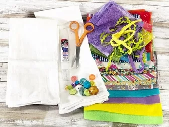 https://creativelybethcomf5489.zapwp.com/q:i/r:1/wp:1/w:158/u:https://creativelybeth.com/wp-content/uploads/2022/01/Easy-Butterfly-Flour-Sack-Towels-Materials-Creatively-Beth.jpg