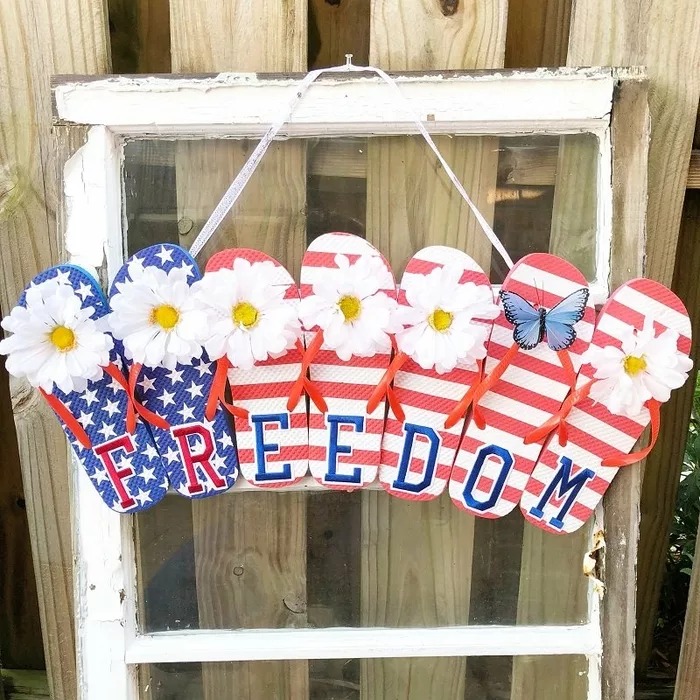 https://creativelybethcomf5489.zapwp.com/q:i/r:1/wp:1/w:340/u:https://creativelybeth.com/wp-content/uploads/2020/06/DOLLAR-TREE-FLIP-FLOP-FREEDOM-SIGN-CREATIVELY-BETH-1.jpg