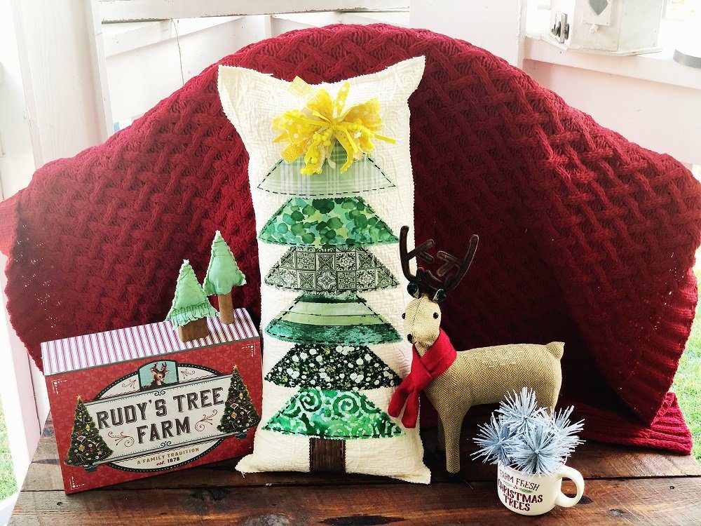 https://creativelybethcomf5489.zapwp.com/q:intelligent/r:0/wp:0/w:1/u:https://creativelybeth.com/wp-content/uploads/2021/12/UPCYCLED-CHRISTMAS-TREE-PILLOW-CREATIVELY-BETH-15.jpg